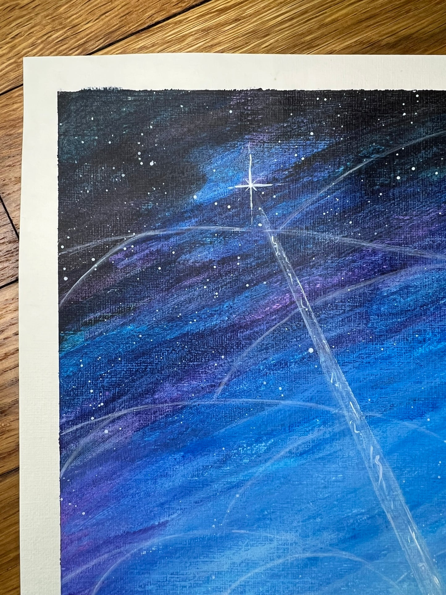 White beam of light connecting figure to star in spiritual dawn sky with subtle energy lines